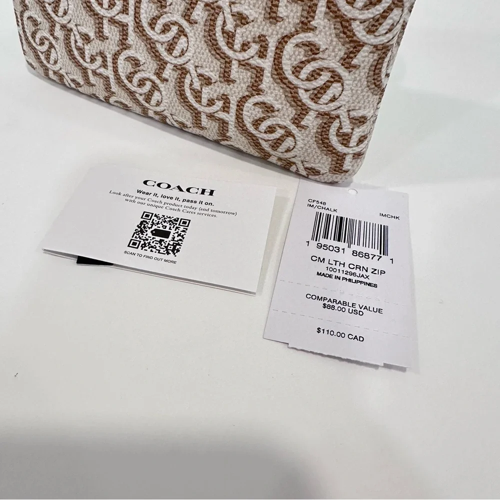 COACH CORNER ZIP WRISTLET WALLET WITH SIGNATURE MONOGRAM PRINT IN CHALK